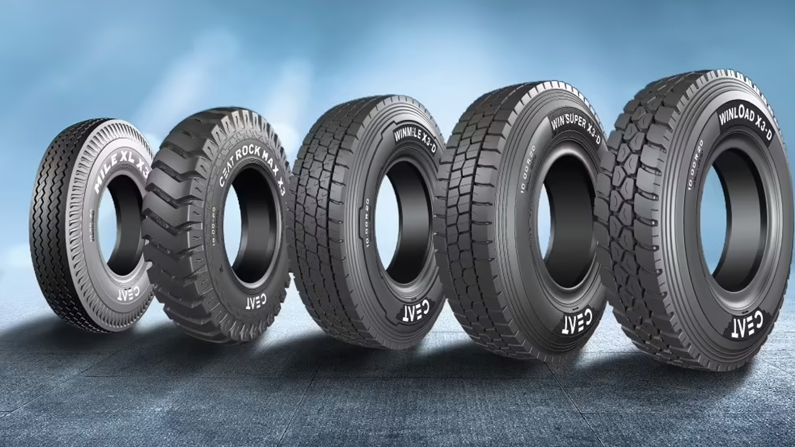 Five CEAT tyres positioned against a blue background.